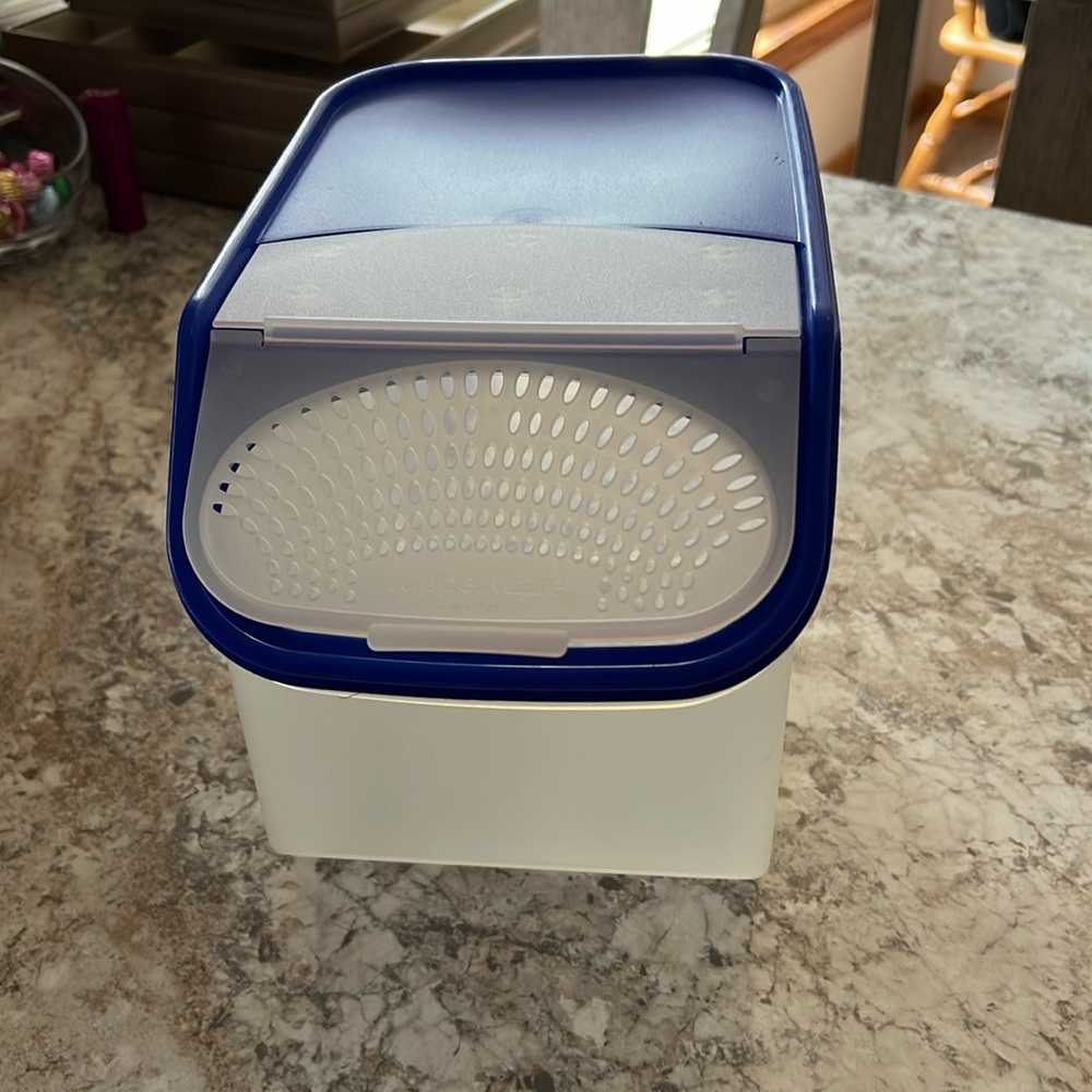 Tupperware storage containers. Recommend for potatoes or onions.